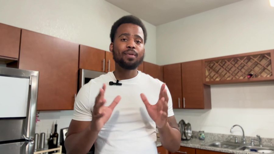 Curtis Shaw cooking in his kitchen